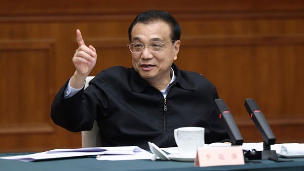 Premier Li chairs symposium on economic situation